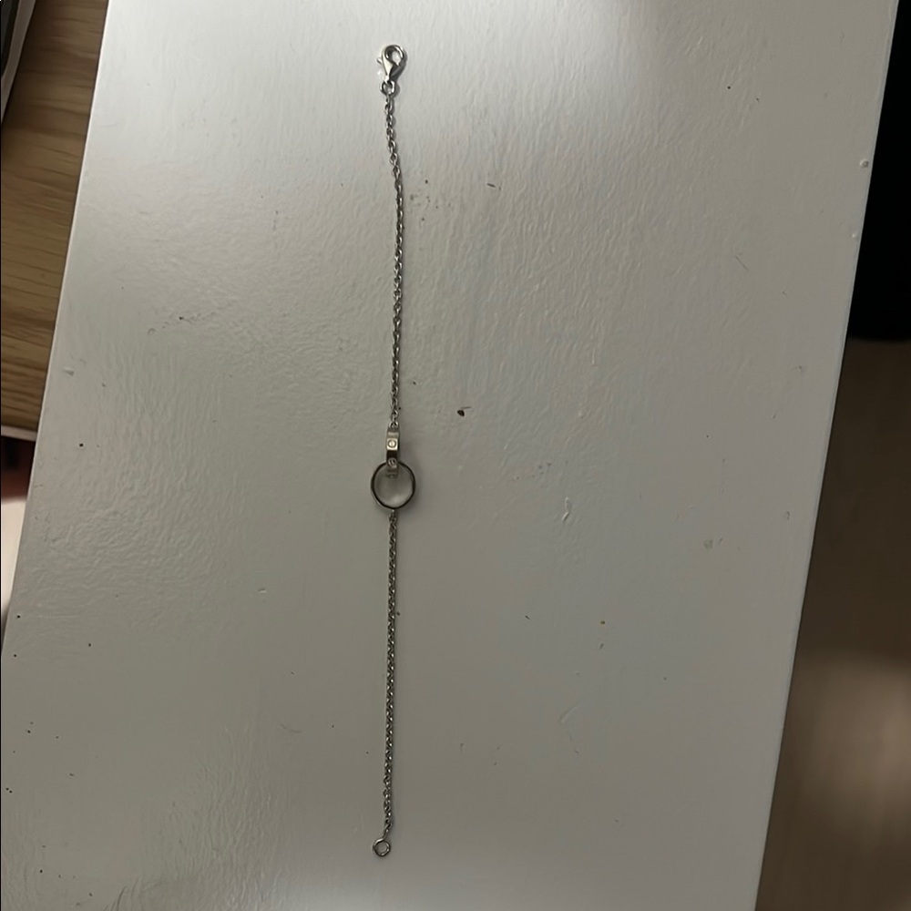 Cartier Silver Bracelet with Dainty Chain and Charm